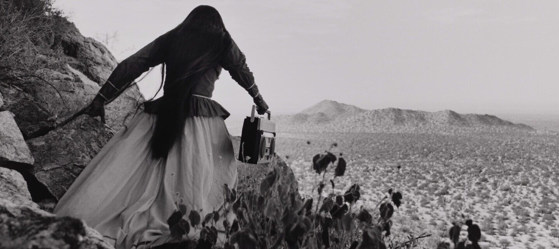 Graciela Iturbide, <em>Mujer Ángel, Desierto de Sonora (Angel Woman, Sonoran Desert)</em>, 1979 (printed 2014); Gelatin silver print, 16 x 20 in.; National Museum of Women in the Arts, Gift of Cindy Jones; © Graciela Iturbide, Image courtesy of Throckmorton Fine Art, NYC