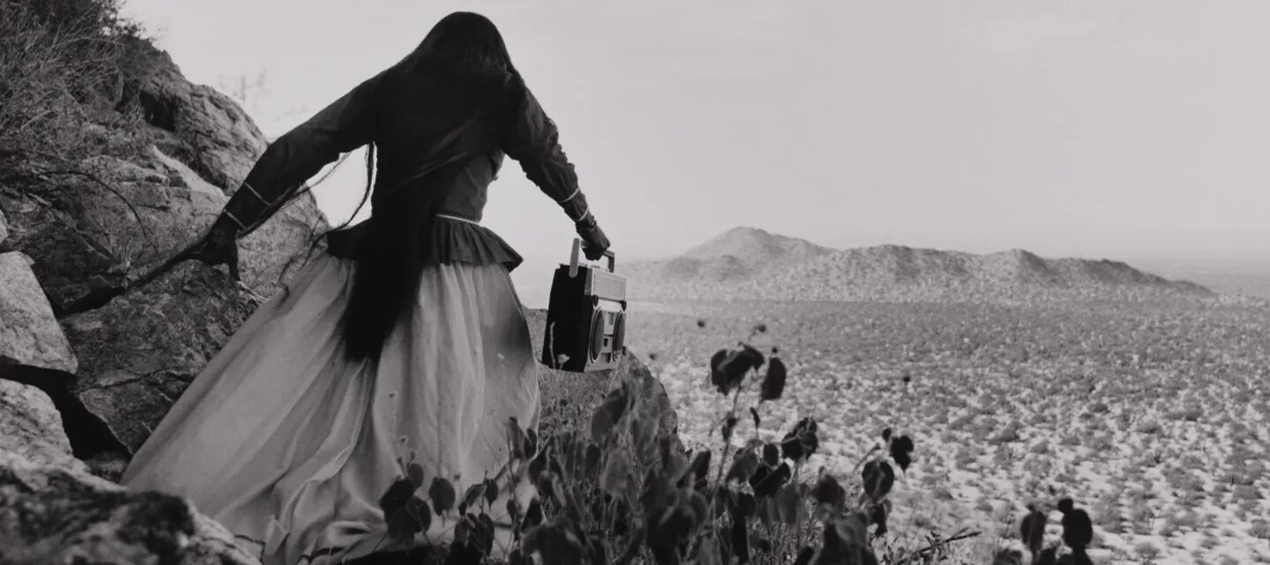 Graciela Iturbide, Mujer Ángel, Desierto de Sonora (Angel Woman, Sonoran Desert), 1979 (printed 2014); Gelatin silver print, 16 x 20 in.; National Museum of Women in the Arts, Gift of Cindy Jones; © Graciela Iturbide, Image courtesy of Throckmorton Fine Art, NYC