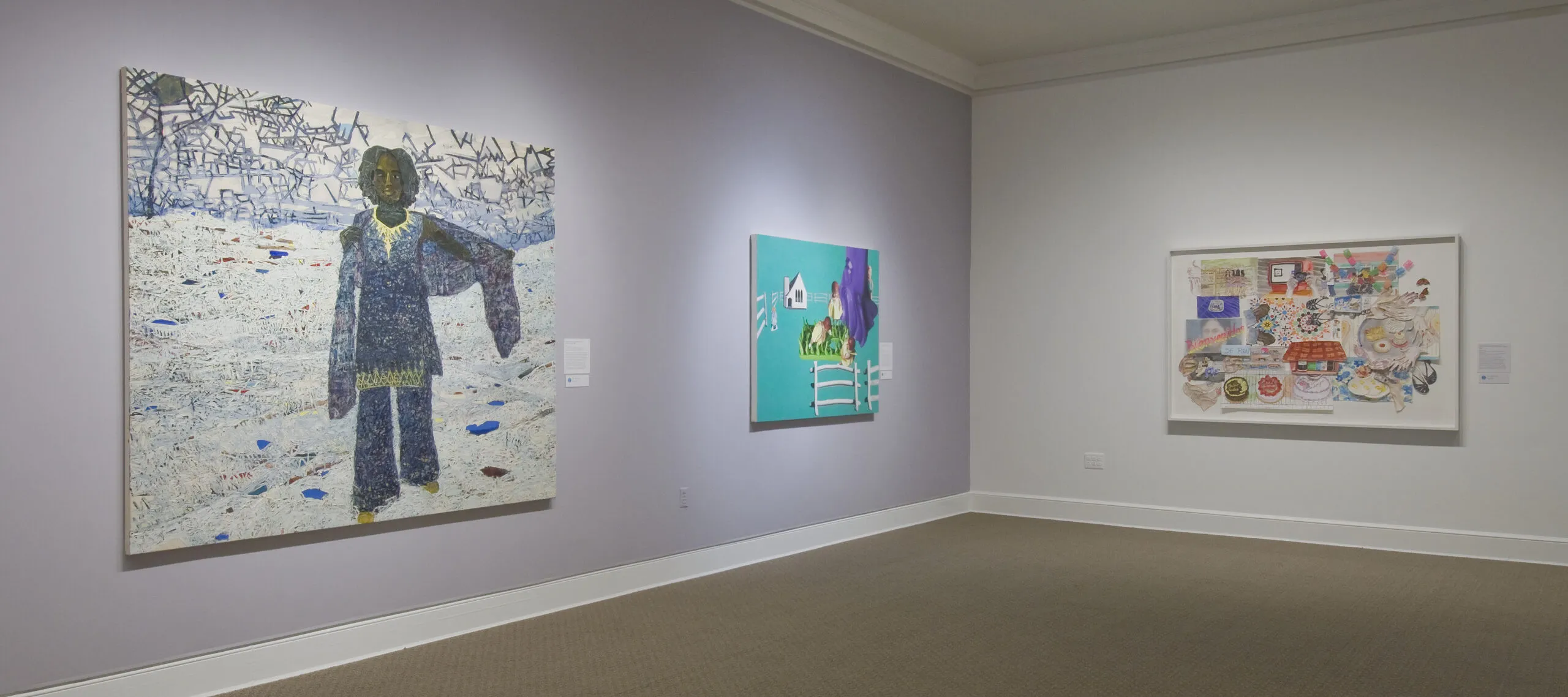 Two large paintings hang on a lavender wall. In the first, a dark-skinned woman stands in a white landscape, and in the other, a fence, house, and large birds float on a solid turquoise background. On the other white wall is an abstract multimedia work with houses, cakes, and patterns.