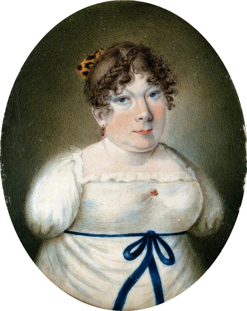 A miniature watercolor painting features a light-skinned woman with underdeveloped arms wearing a white dress with a blue ribbon tied around the bodice. Her curly brown hair is worn up in a bow. She looks at the viewer with a neutral expression.