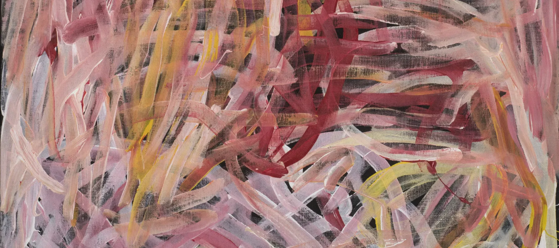 Abstract painting of long, layered brushstrokes in shades of red, pink, orange and white, laid over a black background. The brushstrokes intersect, weave together, and overlap, creating a frenzied web of lines.