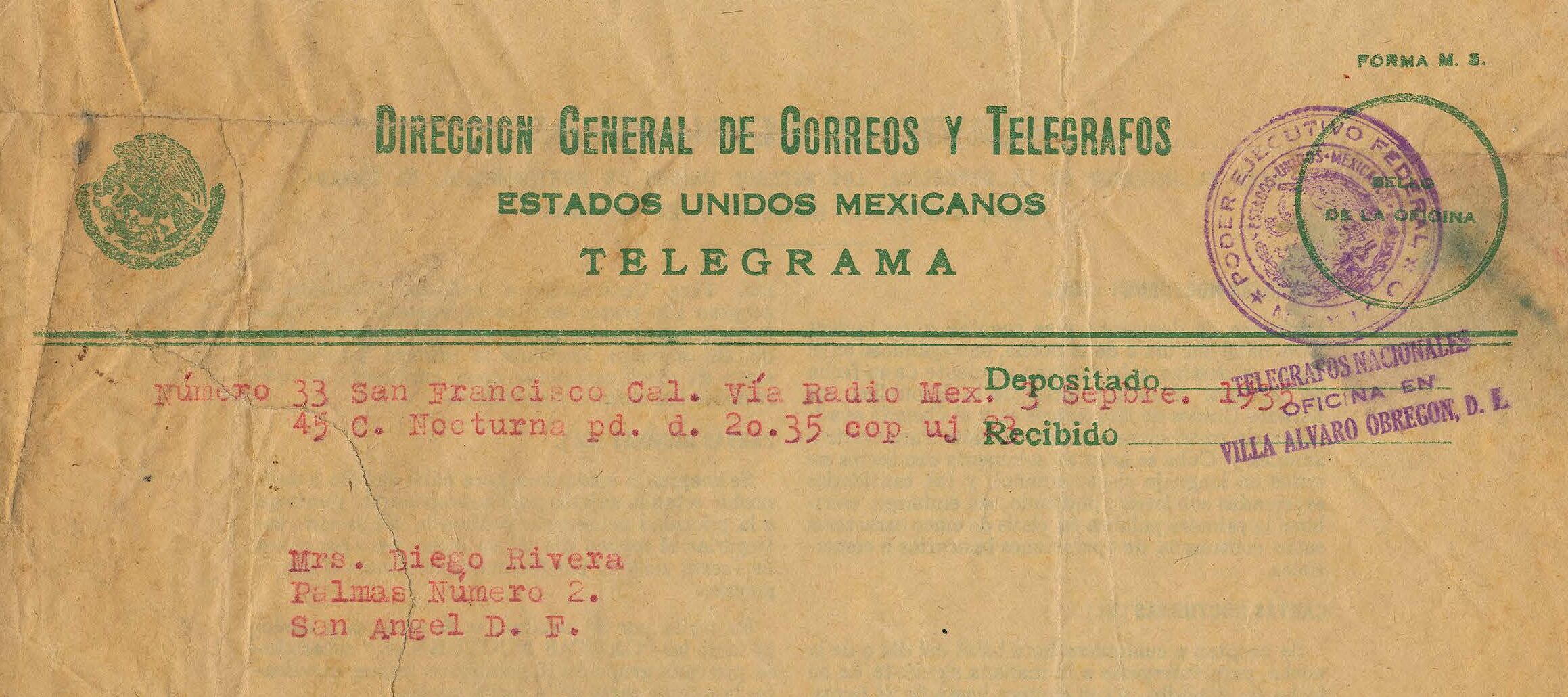 Typewritten telegram in red on tan paper.