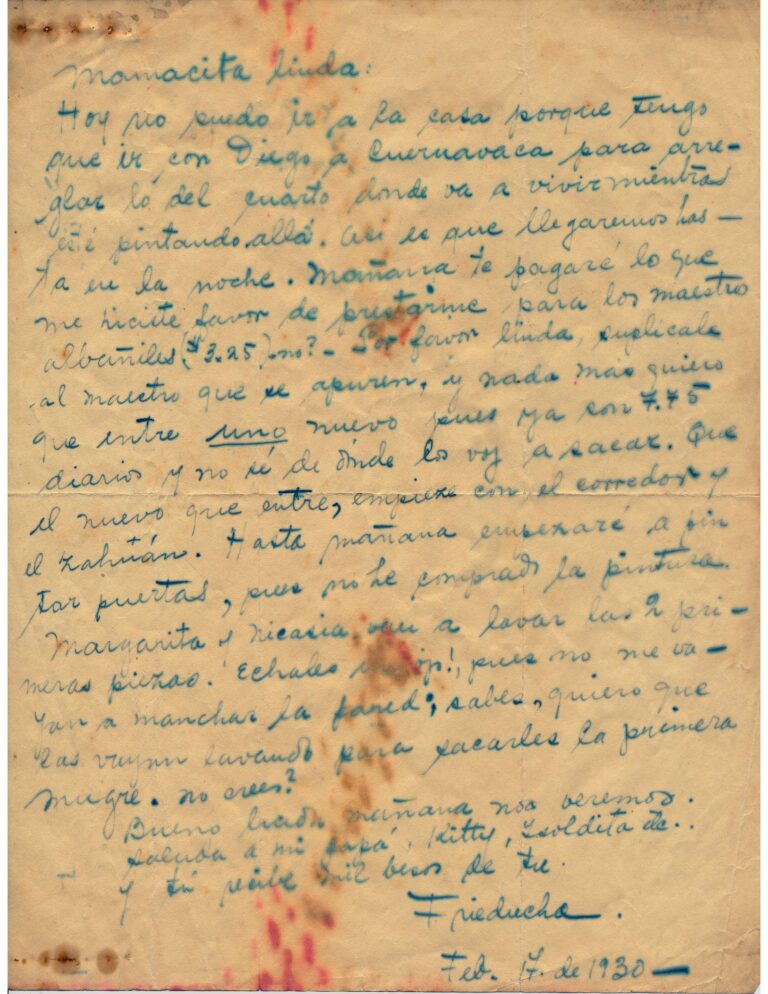 Handwritten letter on yellowed paper with some dark brown and red staining.
