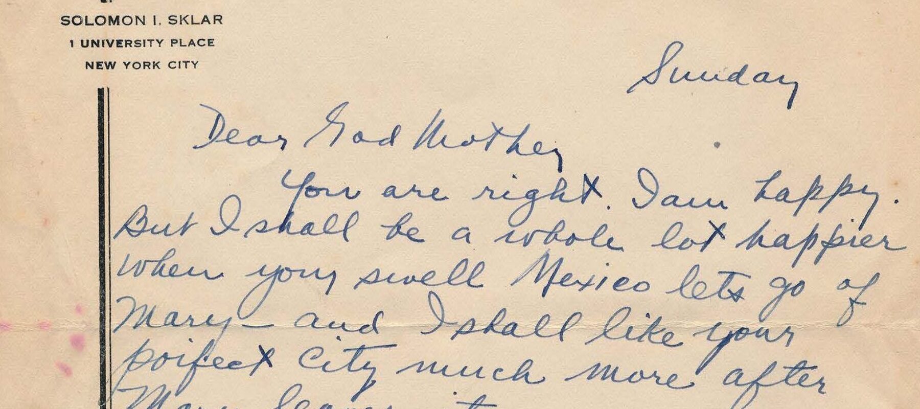 Handwritten letter on yellowed stationery paper.