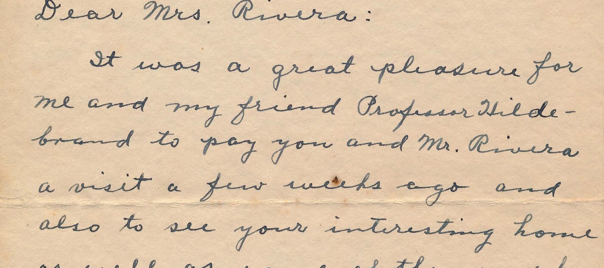 Handwritten letter on yellowed paper.