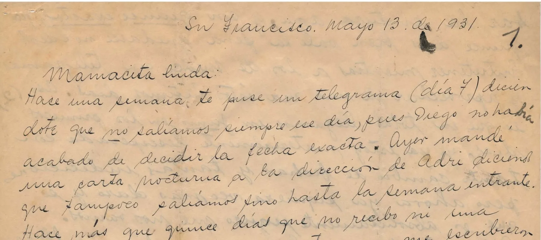 Handwritten letter on yellowed paper with black ink stains.