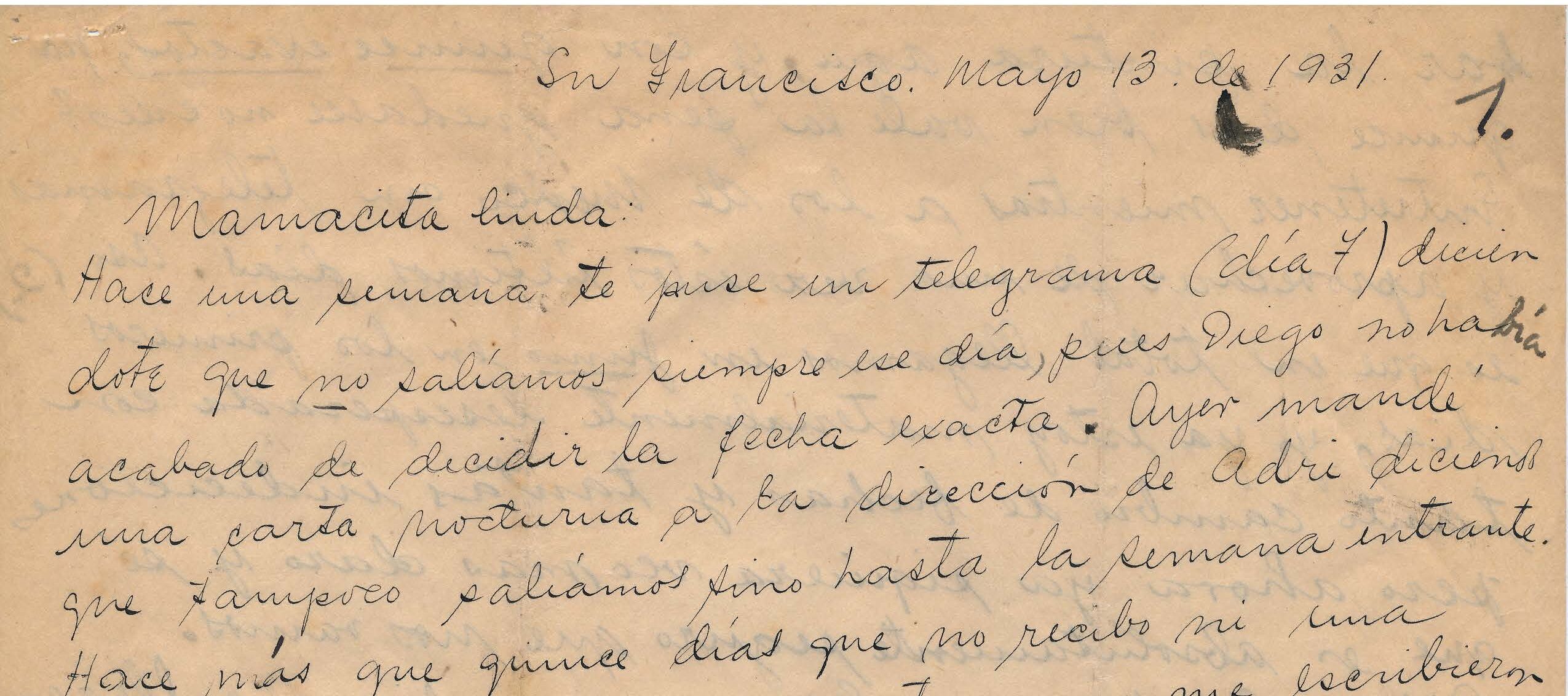 Handwritten letter on yellowed paper with black ink stains.