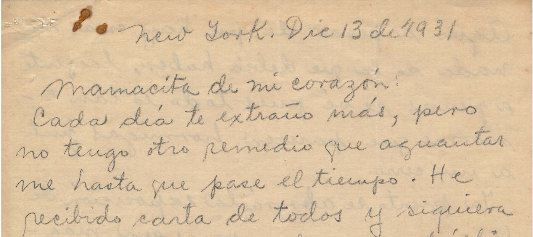 Handwritten letter on yellowed paper with brown staining.