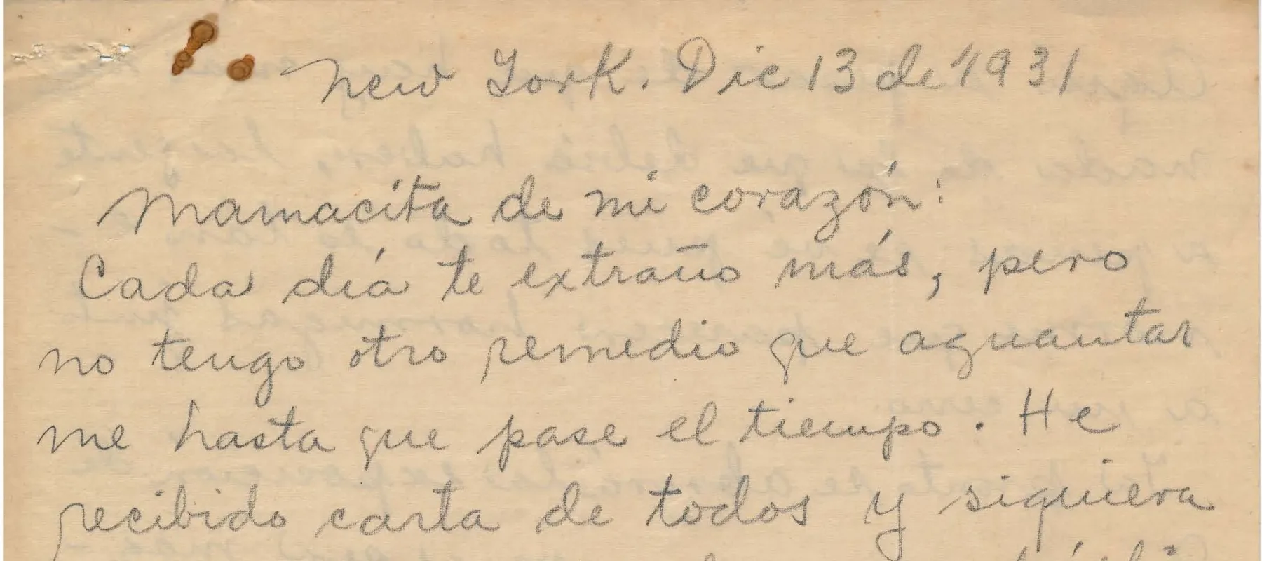 Handwritten letter on yellowed paper with brown staining.