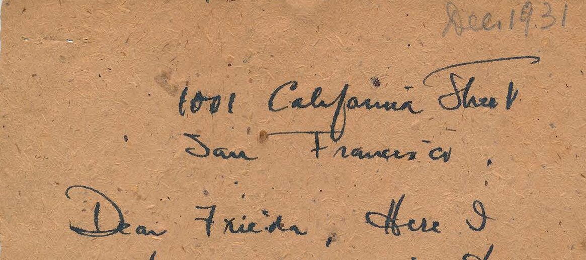 Handwritten letter on brown paper.