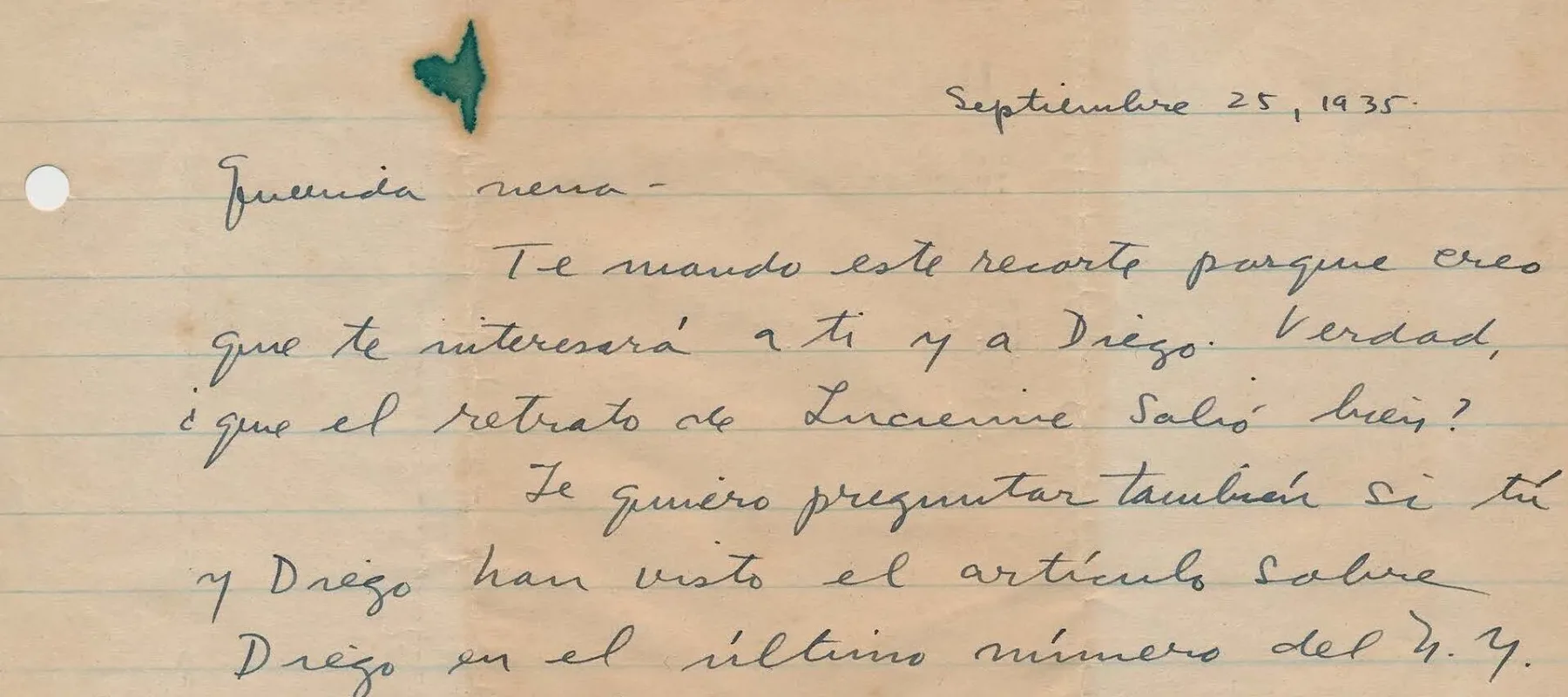 Handwritten letter on lined yellowed paper with a green stain on the top of the page.