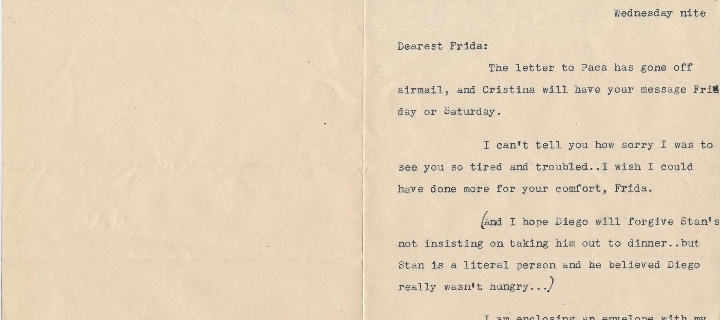 Typewritten letter on a yellowed folded notecard.