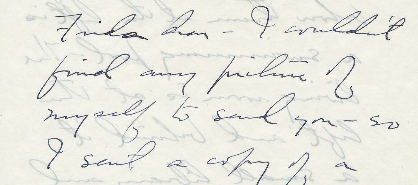 Handwritten letter on white stationery paper.