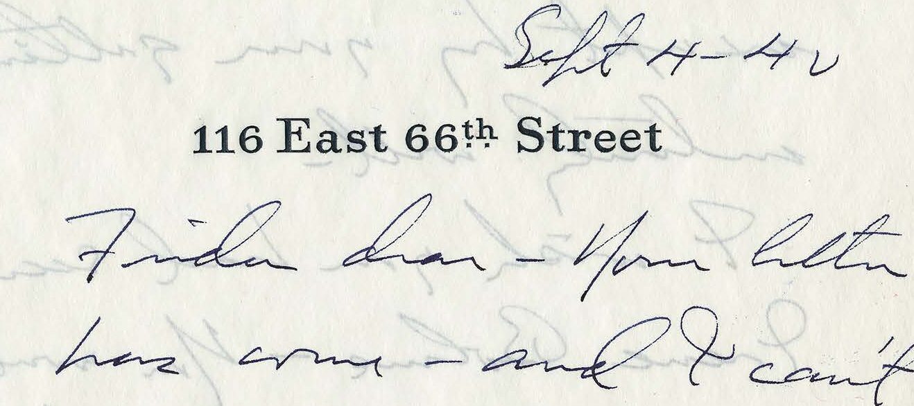 Handwritten letter on white stationery paper.