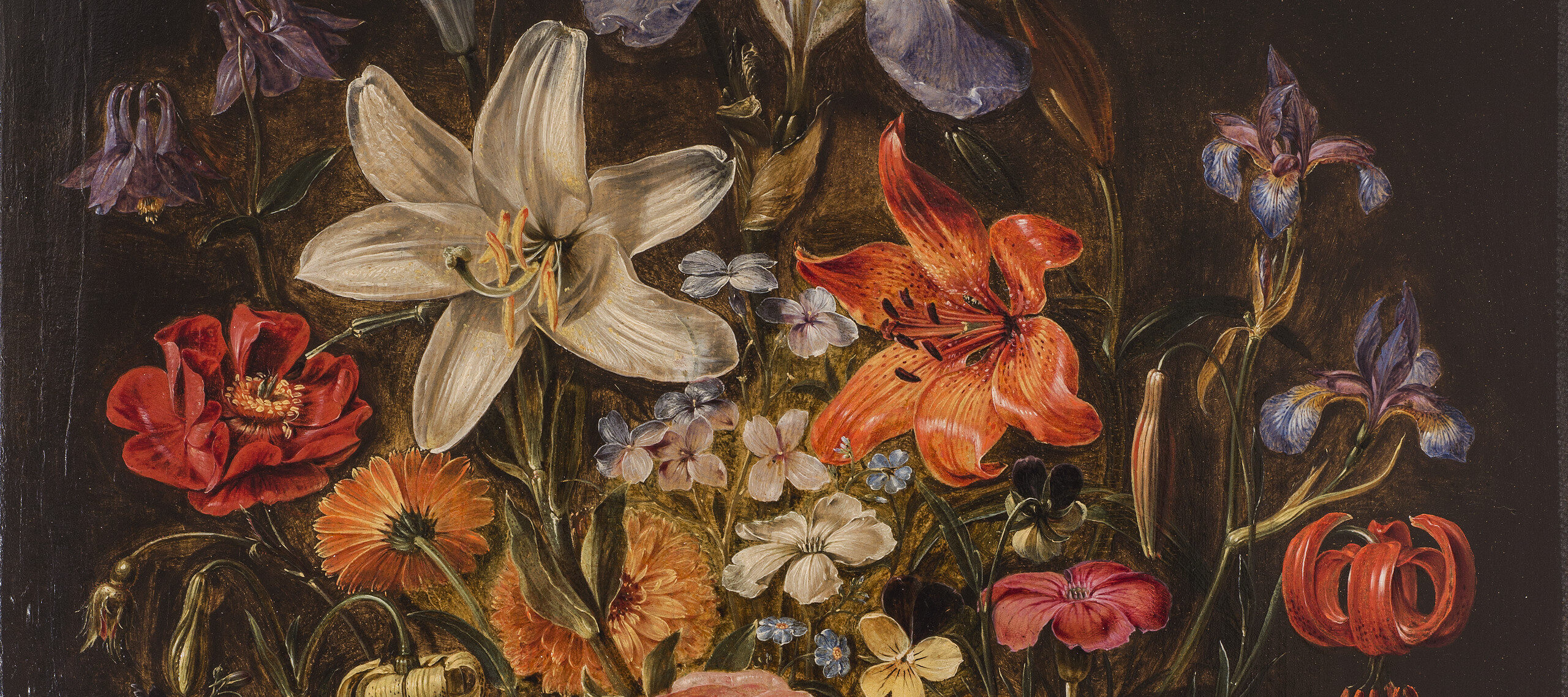 Realistic and detailed, the still life painting meticulously renders a variety of brightly colored flowers densely arranged in a dark round vase set against a dark background. The vase sits upon a stone ledge with two stray pink roses laying in the foreground.