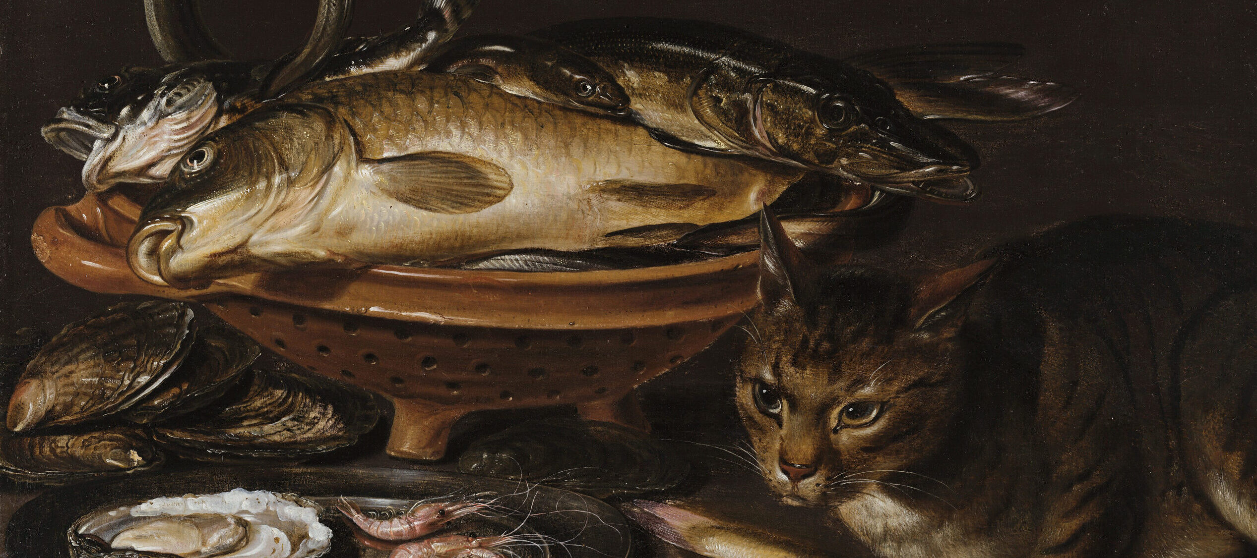 A still life painting featuring a bowl of dead fish, silver platter with an oyster and shrimp, and a cat with a fish in its paws sitting next to it.