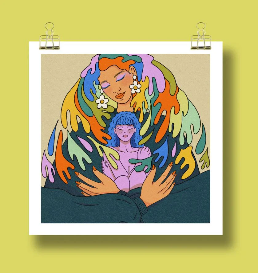 A colorful illustrated print features the figure of a woman hugging a smaller version of herself.