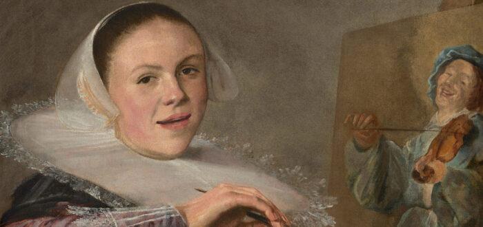 A woman in 17th-century attire sits at an easel, holding brushes and a palette, painting a man playing the violin. She wears a lace ruff and looks toward the viewer with a slight smile.