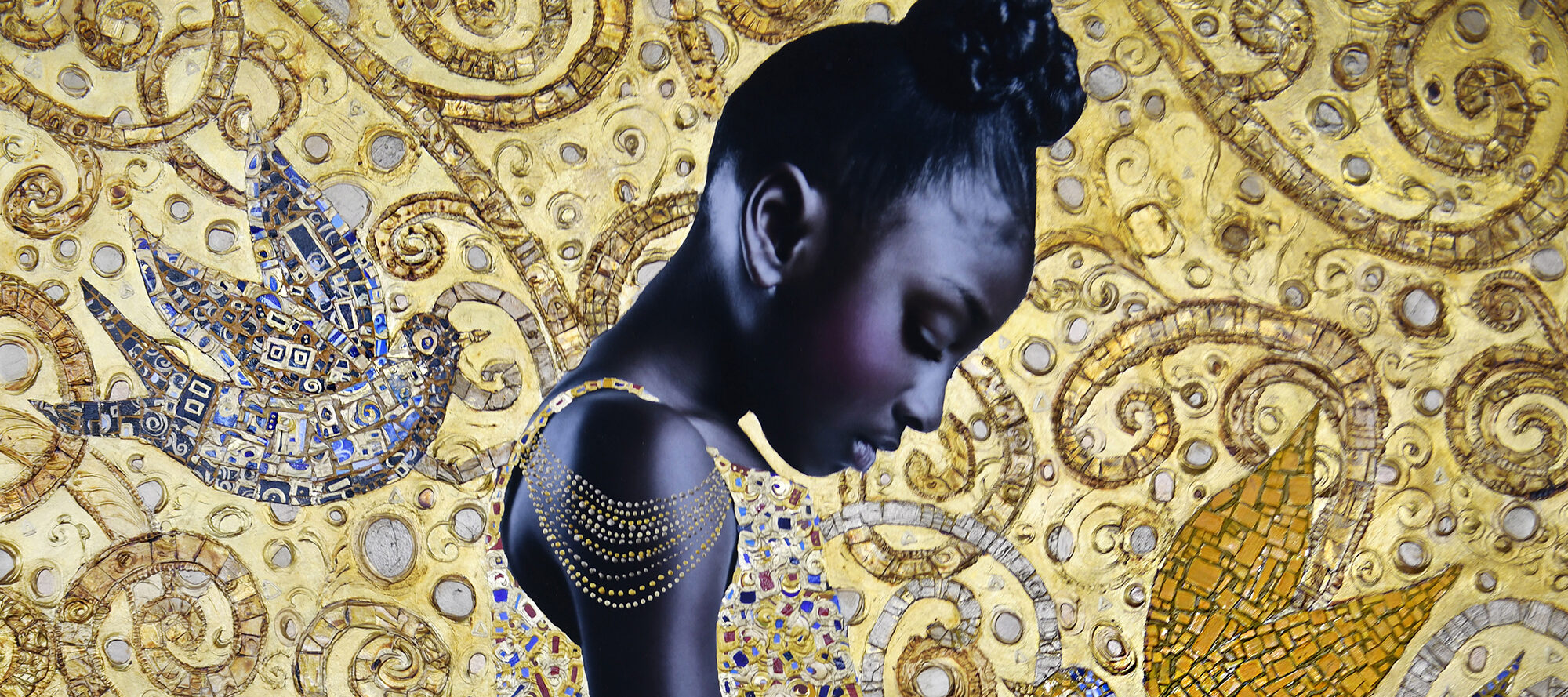 A photograph of a young Black girl in profile, looking down at her hands. Her dress and the image's background are covered in gold leaf. The background features a motif of birds and spirals.